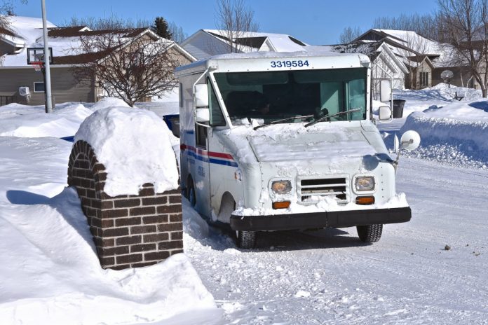 usps-delivery-vehicle-snow-residential-neighborhood.jpg