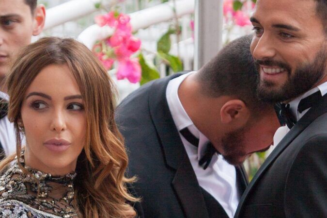 Nabilla Benattia et son époux Thomas Vergara vêtus en tenue de soirée.